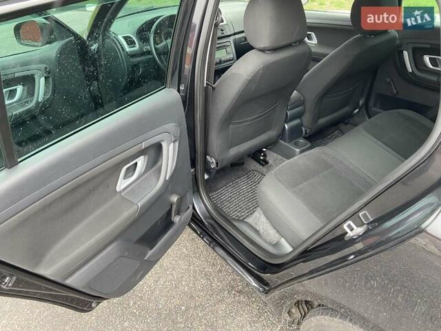 Черный Шкода Фабия, объемом двигателя 1.6 л и пробегом 192 тыс. км за 5800 $, фото 9 на Automoto.ua