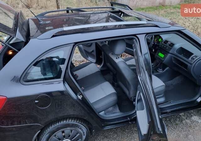 Черный Шкода Фабия, объемом двигателя 1.42 л и пробегом 248 тыс. км за 5000 $, фото 5 на Automoto.ua