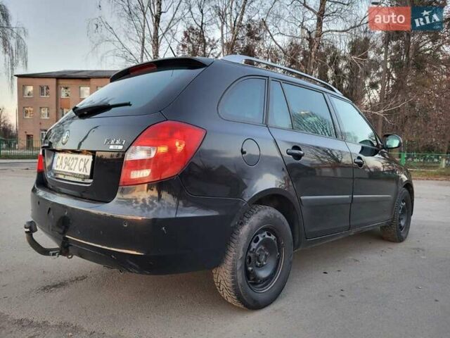 Черный Шкода Фабия, объемом двигателя 1.4 л и пробегом 335 тыс. км за 4200 $, фото 2 на Automoto.ua
