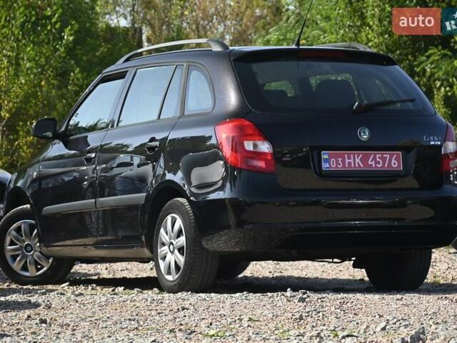 Черный Шкода Фабия, объемом двигателя 1.4 л и пробегом 235 тыс. км за 5800 $, фото 8 на Automoto.ua