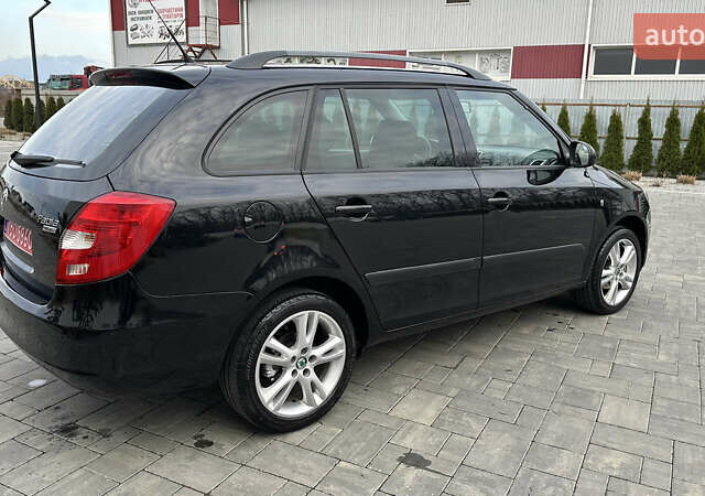 Черный Шкода Фабия, объемом двигателя 1.6 л и пробегом 205 тыс. км за 5800 $, фото 6 на Automoto.ua