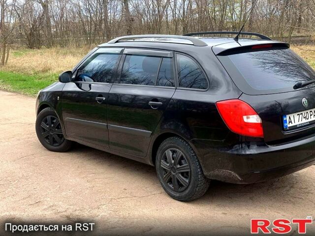 Черный Шкода Фабия, объемом двигателя 1.4 л и пробегом 250 тыс. км за 5700 $, фото 4 на Automoto.ua