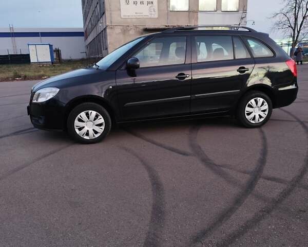 Черный Шкода Фабия, объемом двигателя 1.4 л и пробегом 197 тыс. км за 5800 $, фото 6 на Automoto.ua