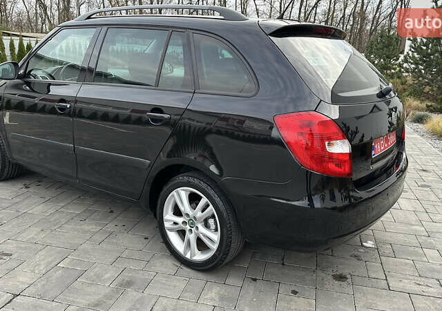 Черный Шкода Фабия, объемом двигателя 1.6 л и пробегом 205 тыс. км за 5800 $, фото 4 на Automoto.ua