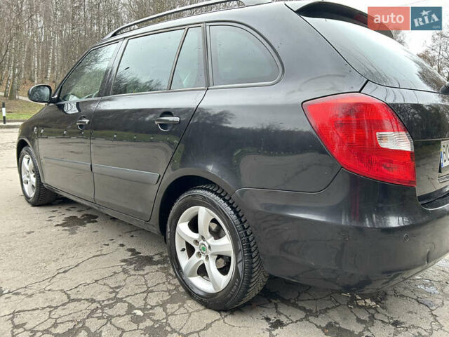 Черный Шкода Фабия, объемом двигателя 1.39 л и пробегом 202 тыс. км за 5750 $, фото 6 на Automoto.ua