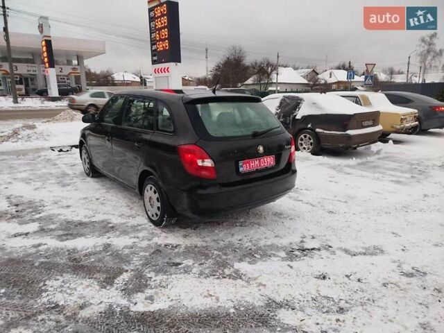 Черный Шкода Фабия, объемом двигателя 1.4 л и пробегом 216 тыс. км за 5200 $, фото 6 на Automoto.ua