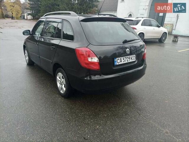Черный Шкода Фабия, объемом двигателя 1.6 л и пробегом 192 тыс. км за 5800 $, фото 4 на Automoto.ua
