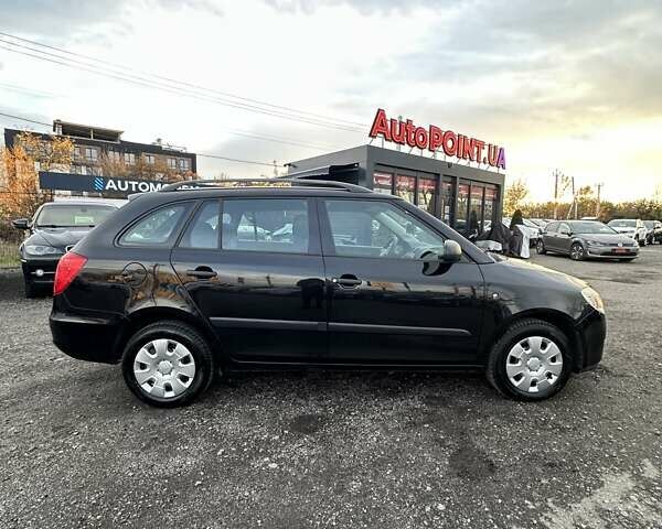 Чорний Шкода Фабія, об'ємом двигуна 1.39 л та пробігом 172 тис. км за 5999 $, фото 4 на Automoto.ua