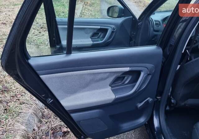 Черный Шкода Фабия, объемом двигателя 1.42 л и пробегом 248 тыс. км за 5000 $, фото 12 на Automoto.ua