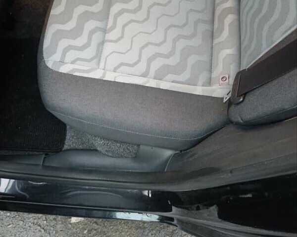 Черный Шкода Фабия, объемом двигателя 1.4 л и пробегом 205 тыс. км за 5999 $, фото 6 на Automoto.ua