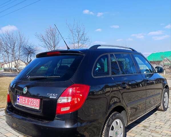 Черный Шкода Фабия, объемом двигателя 1.6 л и пробегом 195 тыс. км за 5700 $, фото 4 на Automoto.ua