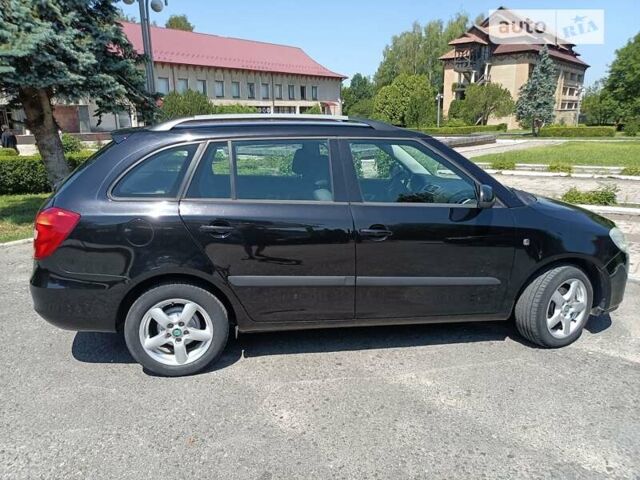 Черный Шкода Фабия, объемом двигателя 1.4 л и пробегом 142 тыс. км за 5450 $, фото 11 на Automoto.ua