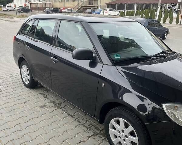Черный Шкода Фабия, объемом двигателя 1.4 л и пробегом 205 тыс. км за 5400 $, фото 7 на Automoto.ua
