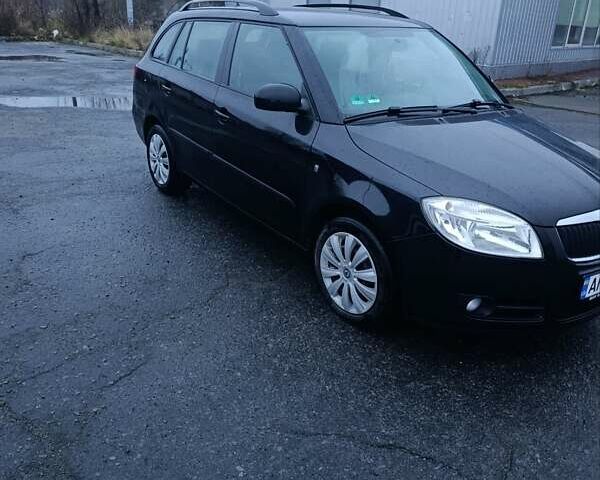 Черный Шкода Фабия, объемом двигателя 1.4 л и пробегом 205 тыс. км за 5999 $, фото 4 на Automoto.ua
