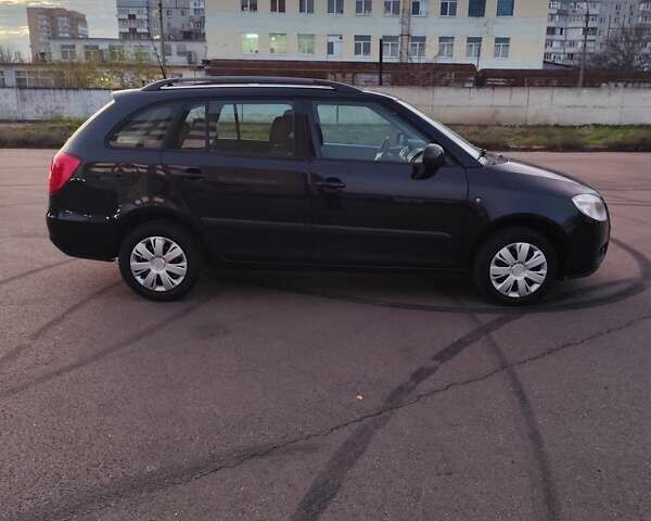Черный Шкода Фабия, объемом двигателя 1.4 л и пробегом 197 тыс. км за 5800 $, фото 14 на Automoto.ua