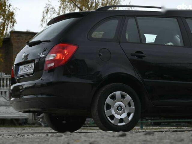 Черный Шкода Фабия, объемом двигателя 1.4 л и пробегом 205 тыс. км за 5600 $, фото 15 на Automoto.ua