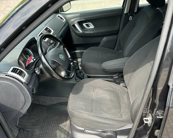 Черный Шкода Фабия, объемом двигателя 1.39 л и пробегом 225 тыс. км за 5650 $, фото 10 на Automoto.ua