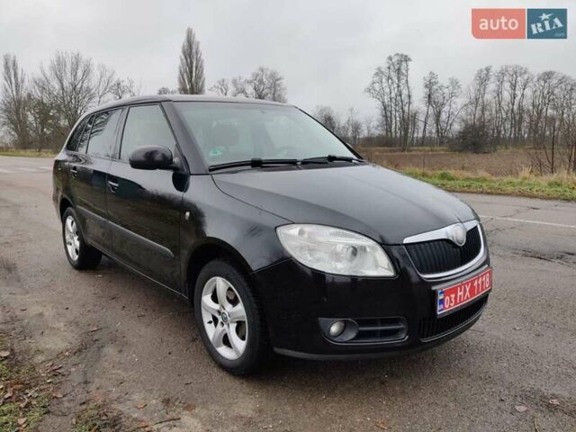 Черный Шкода Фабия, объемом двигателя 1.4 л и пробегом 201 тыс. км за 5750 $, фото 4 на Automoto.ua