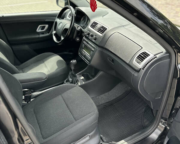 Черный Шкода Фабия, объемом двигателя 1.39 л и пробегом 225 тыс. км за 5650 $, фото 16 на Automoto.ua