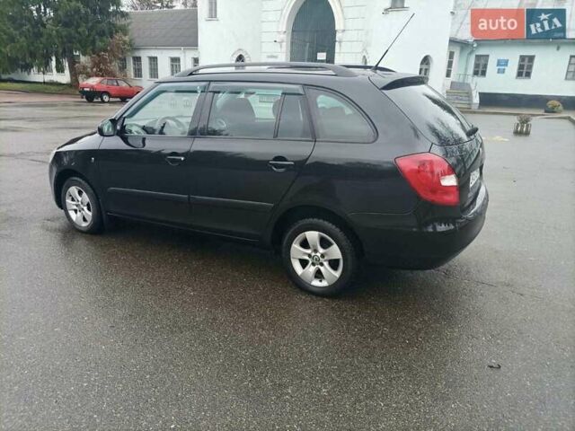 Черный Шкода Фабия, объемом двигателя 1.6 л и пробегом 192 тыс. км за 5800 $, фото 3 на Automoto.ua
