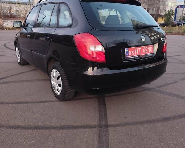 Черный Шкода Фабия, объемом двигателя 1.4 л и пробегом 197 тыс. км за 5800 $, фото 8 на Automoto.ua