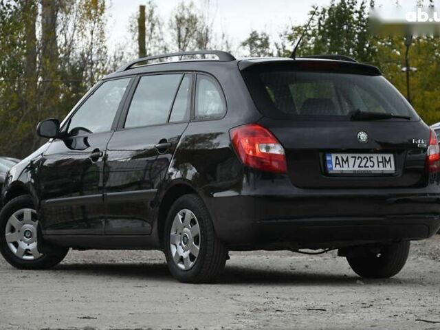 Черный Шкода Фабия, объемом двигателя 1.4 л и пробегом 205 тыс. км за 5600 $, фото 11 на Automoto.ua