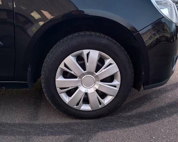 Черный Шкода Фабия, объемом двигателя 1.4 л и пробегом 197 тыс. км за 5800 $, фото 15 на Automoto.ua