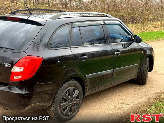 Черный Шкода Фабия, объемом двигателя 1.4 л и пробегом 250 тыс. км за 5700 $, фото 3 на Automoto.ua