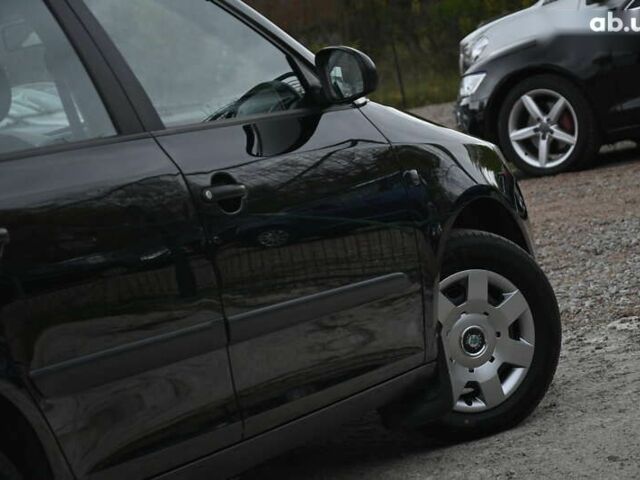 Черный Шкода Фабия, объемом двигателя 1.4 л и пробегом 205 тыс. км за 5600 $, фото 17 на Automoto.ua