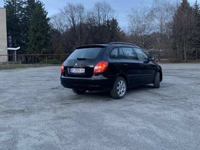 Черный Шкода Фабия, объемом двигателя 1.4 л и пробегом 228 тыс. км за 6999 $, фото 4 на Automoto.ua