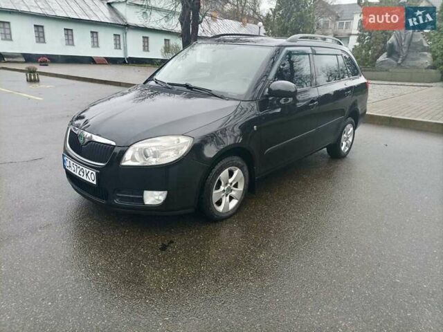 Черный Шкода Фабия, объемом двигателя 1.6 л и пробегом 192 тыс. км за 5800 $, фото 2 на Automoto.ua