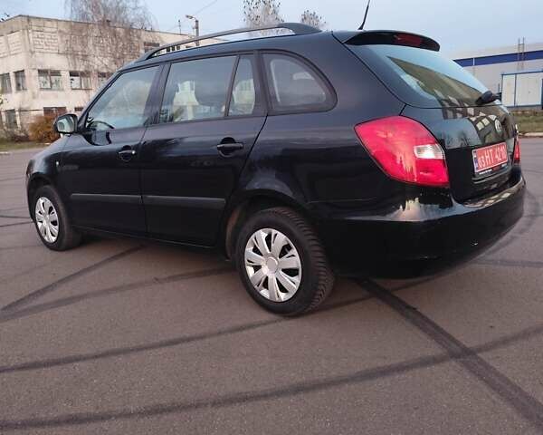 Черный Шкода Фабия, объемом двигателя 1.4 л и пробегом 197 тыс. км за 5800 $, фото 7 на Automoto.ua