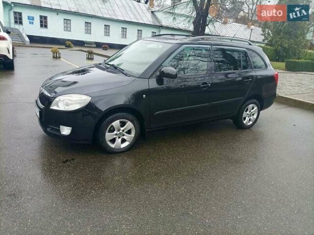 Черный Шкода Фабия, объемом двигателя 1.6 л и пробегом 192 тыс. км за 5800 $, фото 1 на Automoto.ua