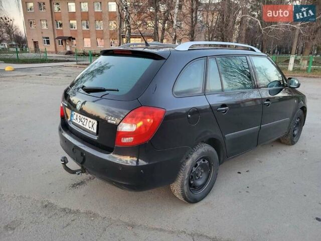 Черный Шкода Фабия, объемом двигателя 1.4 л и пробегом 335 тыс. км за 4200 $, фото 11 на Automoto.ua