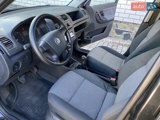 Черный Шкода Фабия, объемом двигателя 1.4 л и пробегом 295 тыс. км за 4350 $, фото 14 на Automoto.ua