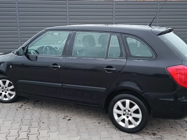 Черный Шкода Фабия, объемом двигателя 1.4 л и пробегом 200 тыс. км за 5200 $, фото 4 на Automoto.ua