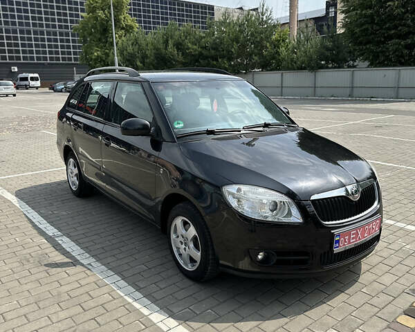 Черный Шкода Фабия, объемом двигателя 1.39 л и пробегом 225 тыс. км за 5650 $, фото 4 на Automoto.ua