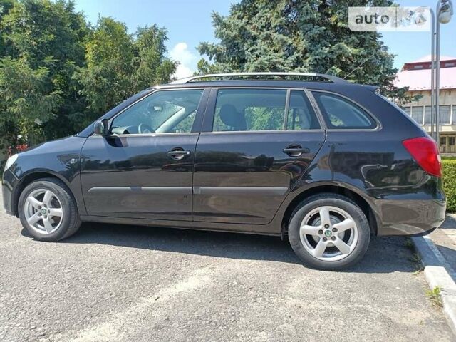 Черный Шкода Фабия, объемом двигателя 1.4 л и пробегом 142 тыс. км за 5450 $, фото 13 на Automoto.ua