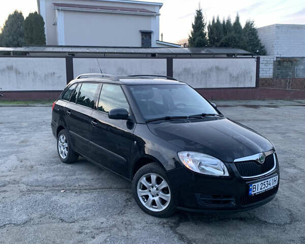 Черный Шкода Фабия, объемом двигателя 1.39 л и пробегом 230 тыс. км за 6999 $, фото 2 на Automoto.ua