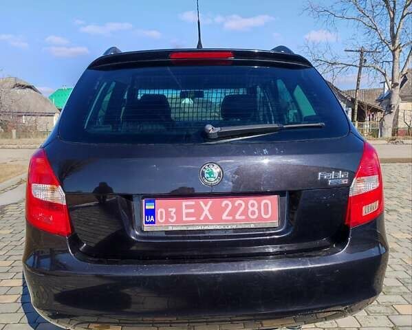 Черный Шкода Фабия, объемом двигателя 1.6 л и пробегом 195 тыс. км за 5700 $, фото 5 на Automoto.ua