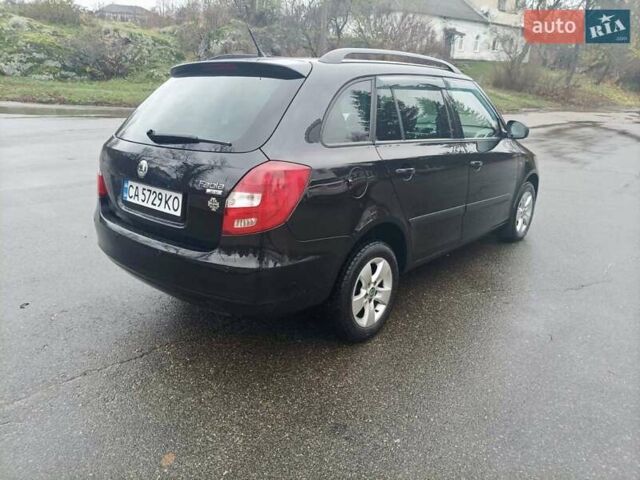Черный Шкода Фабия, объемом двигателя 1.6 л и пробегом 192 тыс. км за 5800 $, фото 6 на Automoto.ua