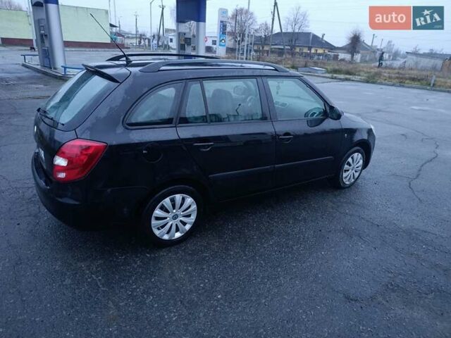 Черный Шкода Фабия, объемом двигателя 1.4 л и пробегом 205 тыс. км за 5999 $, фото 3 на Automoto.ua