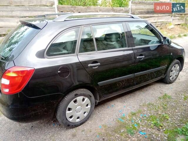 Черный Шкода Фабия, объемом двигателя 1.2 л и пробегом 192 тыс. км за 4250 $, фото 5 на Automoto.ua