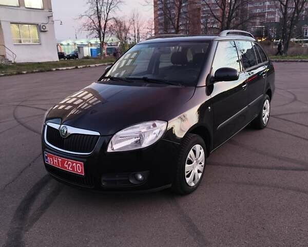Черный Шкода Фабия, объемом двигателя 1.4 л и пробегом 197 тыс. км за 5800 $, фото 1 на Automoto.ua