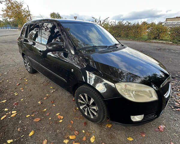 Черный Шкода Фабия, объемом двигателя 1.42 л и пробегом 240 тыс. км за 5700 $, фото 2 на Automoto.ua