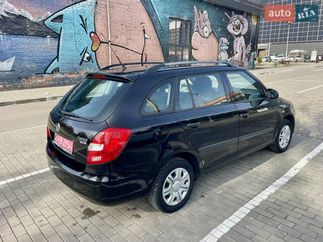 Черный Шкода Фабия, объемом двигателя 1.39 л и пробегом 180 тыс. км за 5000 $, фото 7 на Automoto.ua