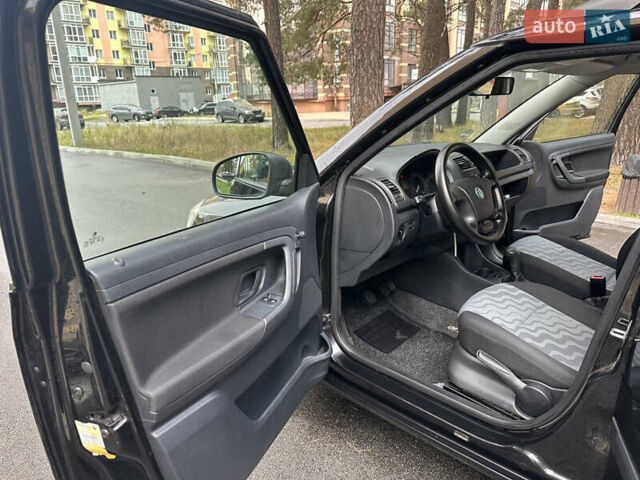 Черный Шкода Фабия, объемом двигателя 1.39 л и пробегом 161 тыс. км за 5550 $, фото 8 на Automoto.ua