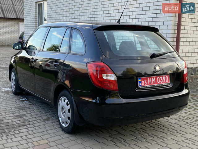 Черный Шкода Фабия, объемом двигателя 1.4 л и пробегом 295 тыс. км за 4350 $, фото 8 на Automoto.ua