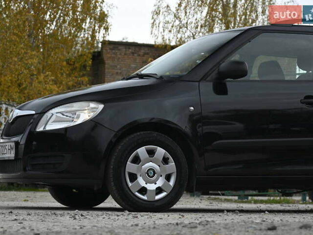 Черный Шкода Фабия, объемом двигателя 1.39 л и пробегом 205 тыс. км за 5499 $, фото 8 на Automoto.ua