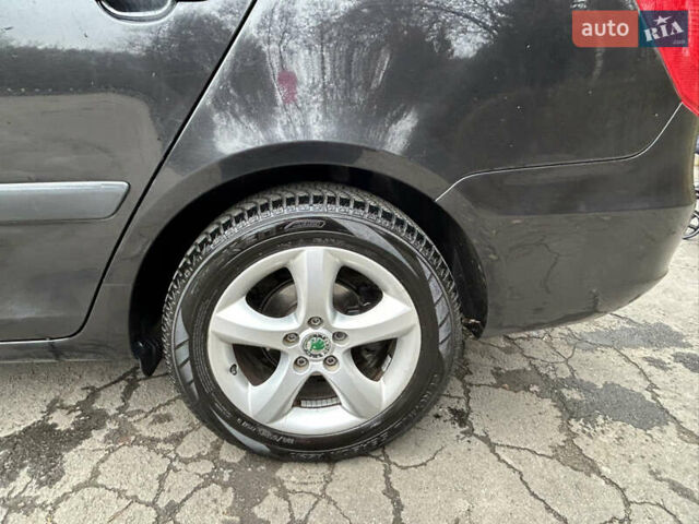 Черный Шкода Фабия, объемом двигателя 1.39 л и пробегом 202 тыс. км за 5750 $, фото 19 на Automoto.ua